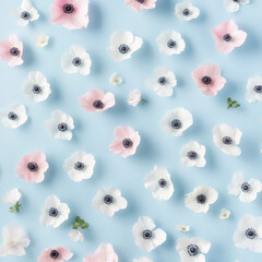 Wall Mural - A pattern of tiny flat anemones in shades of white and pink, evenly spaced on a soft light blue background, creating a delicate and peaceful floral aesthetic.