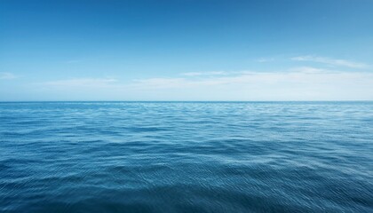 Wall Mural - calm blue ocean with a light blue sky