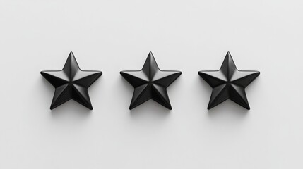 Fototapete - Three glossy black star shapes are lined up neatly against a stark white background, highlighting a minimalist design aesthetic. The stars vary slightly in size but share a uniform style.