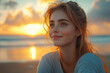 © Sebastian - A woman sitting on a beach at sunset, the warm glow reflecting on her face as she smiles softly. Concept of inner peace.