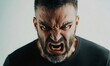 © Ninna Rodrigues - Furious and angry man displaying an aggressive and mad expression