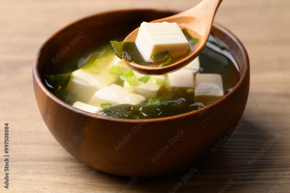 Miso soup with tofu, wakame seaweed and spring onion, Traditional Japanese soup