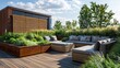 © Adnan saheem - A chic urban roof garden with modular outdoor sofas, privacy screens of woven reed, and a raised hardwood deck