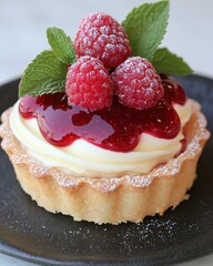 Canvas Print - Delicious raspberry dessert with cream and mint leaves