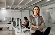 © ThurstanJam/peopleimages.com - Portrait, business woman and manager with arms crossed in office for career experience and job. Face, confident leader and pride of expert tax consultant working at non profit at night on deadline