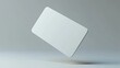 © Pannin - Floating 3D mockup of a blank credit or debit card, white and simple, isolated on a neutral background, perfect for branding and financial design presentations.