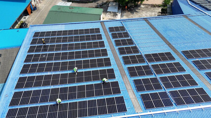 Floating solar panels providing renewable energy. Aerial view floating on solar cells