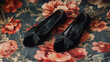 © fotogurmespb - Black velvet ballet flats with ribbon ankle ties on a vintage floral fabric background ballet-inspired fashion