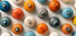 © DJSPIDA FOTO - A vibrant collection of multicolored spray paint cans arranged neatly, showcasing various hues and tints against a clean surface, perfect for art and design projects.
