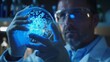 © liliyabatyrova - A man in a lab coat holding a blue glass beaker with a blue substance inside