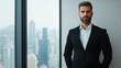 © AI Petr Images - Elegant male executive in a black suit leaning against a minimalist desk cityscape visible through floor to ceiling windows