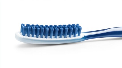 A toothbrush with blue bristles resting horizontally, isolated on a white background