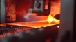 © Ratchadaporn - Close up view of molten glass material being carefully shaped and stretched into flat sheet like panels inside a high temperature industrial furnace or kiln  The glass is in a liquid