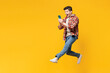 © ViDi Studio - Full body side view young happy man wears red checkered shirt casual clothes jump high hold in hand use mobile cell phone isolated on plain yellow orange background studio portrait. Lifestyle concept.
