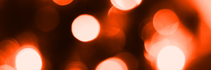 Wall Mural - Blurred lights, dark orange background, banner texture. Abstract bokeh with soft light header. Wide screen wallpaper. Panoramic web banner with copy space for design
