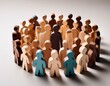 © MDMAJARUL - a paper cut of of a crowd of diverse people; wooden figures around the leader