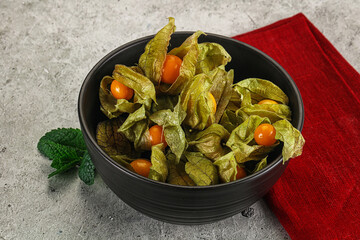 Wall Mural - Sweet ripe physalis in the bowl