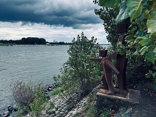 sculpture at a river