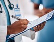 © MDMAJARUL - Hands, prescription and writing with doctor in hospital, closeup for checklist or medical aid. Clipboard, diagnosis and document with healthcare professional person in clinic for planning or research