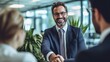 © cusniatul - Businessman Shaking Hands with a Client