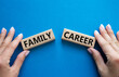 © Natallia - Family or Career symbol. Concept word Family or Career on wooden blocks. Businessman hand. Beautiful blue background. Business and Family or Career concept. Copy space