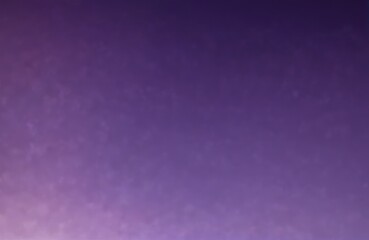 Wall Mural - a purple background with a blurry image of a star