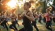 © Aliaksandr Siamko - Outdoor group fitness class exercising in a park