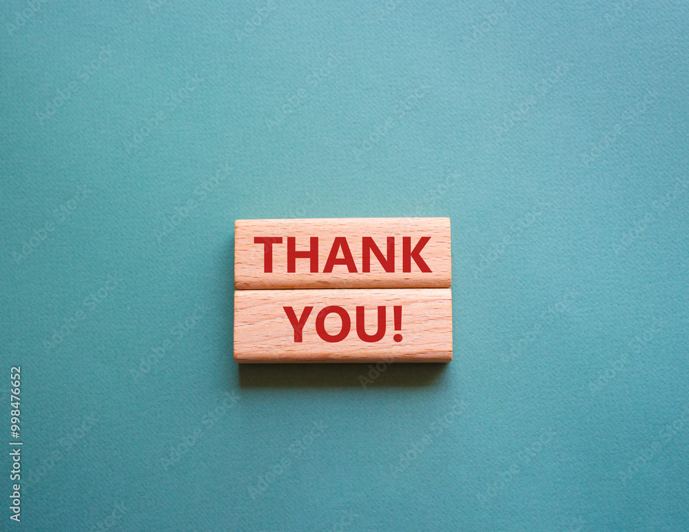 Thank you symbol. Wooden blocks with words Thank you. Beautiful grey ...