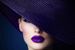 © Luluraschi - stylish woman with oversized future dusk purple hat and violet lipstick