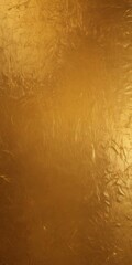 Leinwandbilder - a close-up view textured golden surface, with a slightly reflective and shimmering appearance