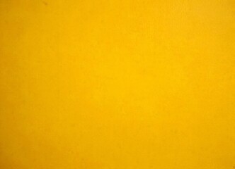 Poster - a simple, unadorned yellow surface, with no discernible text or objects