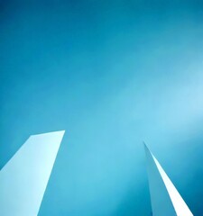 Aufkleber - two white triangular structures against a clear blue sky