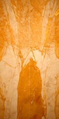 Aufkleber - a close-up view marble surface with a textured, golden-colored pattern The marble appears to be a light-colored marble with a darker, more intricate pattern The