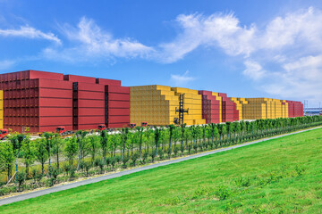 Aufkleber - Stacked containers and natural scenery in port