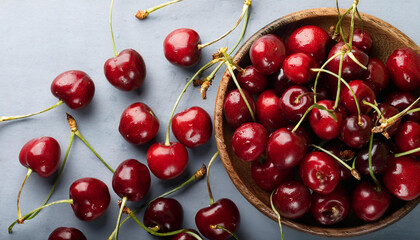 Fresh ripe cherries in white stainless steel colander. Top view of wet red cherry over white woden background. Shallow DOF. Cherries aestetic. Copy space