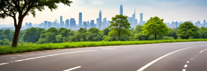 Poster - A cityscape with tall buildings in the background and a winding road in the foreground, surrounded by lush green trees