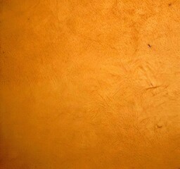 Aufkleber - a close-up textured beige surface, possibly a wall or a piece of furniture, with a subtle pattern of small lines or scratches