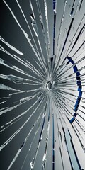 Leinwandbilder - a close-up view shattered glass surface, with the broken pieces radiating outward in a radial pattern