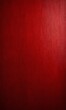 © Bualong - a close-up view of a textured red surface, possibly a wall or a canvas, with a gradient effect transitioning from a darker shade at the top to a lighter one at the bottom.