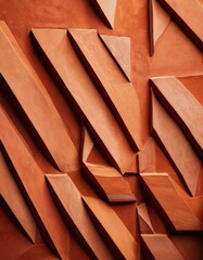 Leinwandbilder - a close-up view textured surface with a repeating pattern of triangular shapes in varying shades of orange