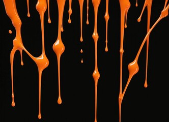 Poster - Orange paint drips and splatters against a black background, creating a dynamic and abstract visual effect