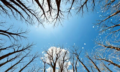 Poster - A winter scene with bare trees against a clear blue sky, with snowflakes falling from the sky
