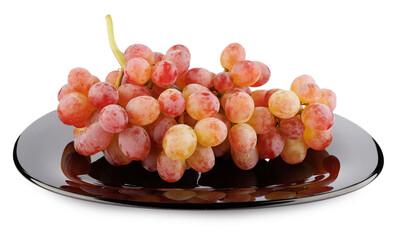 Wall Mural - A juicy beautiful bunch of grapes lying in a black plate isolated on a white background.