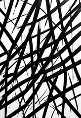Aufkleber - a black and white abstract composition featuring intersecting lines and brushstrokes, creating a sense of depth and texture
