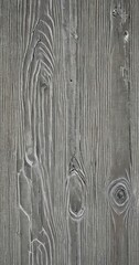 Leinwandbilder - a close-up view wooden surface with visible grain patterns and knots, creating a textured and weathered appearance