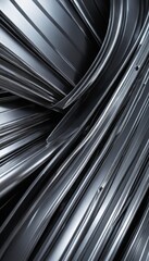 Leinwandbilder - a close-up view metallic surface with a repeating pattern of curved lines and angles, creating a sense of depth and complexity