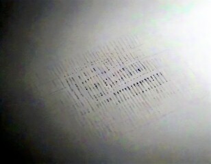 Fototapete - a white surface with a faint, diagonal pattern of small black lines or dots, creating a sense of depth and texture
