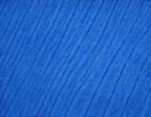 Aufkleber - A close-up view of a blue fabric with diagonal lines, creating a textured and patterned appearance.