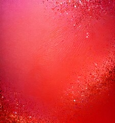 Wall Mural - a pinkish-red background with a subtle texture and scattered glitter particles, creating a visually appealing and dynamic composition