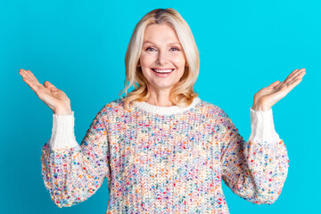 Canvas Print - Portrait of nice aged woman toothy smile raise arms wear sweater isolated on teal color background